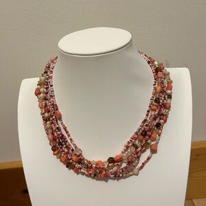 Fun beaded choker with peach and orange tones